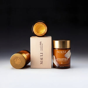 MAULI skincare products on a gradient background