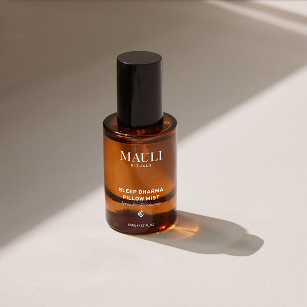 Bottle of Mauli Rituals Sleep Dharma Pillow Mist on a neutral background