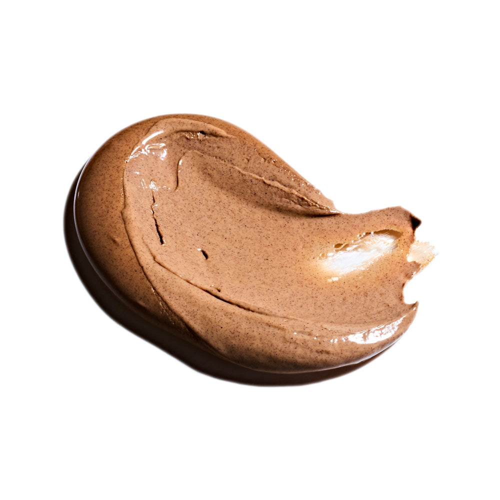 Jar of 'The Honey Mud' by May Lindstrom on a white background