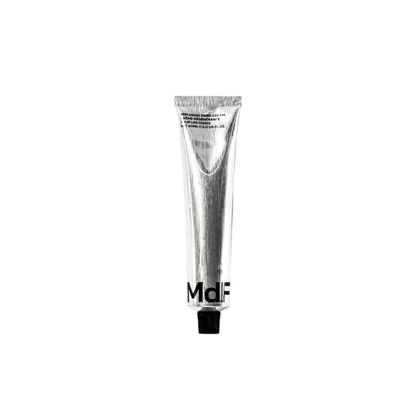 MDF Beauty hand cream in silver tube on a white background