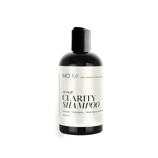 MO MI Beauty Clarity Shampoo bottle with natural ingredients like eucalyptus, lavender, and pomegranate. A deep-cleansing shampoo that refreshes hair and scalp.