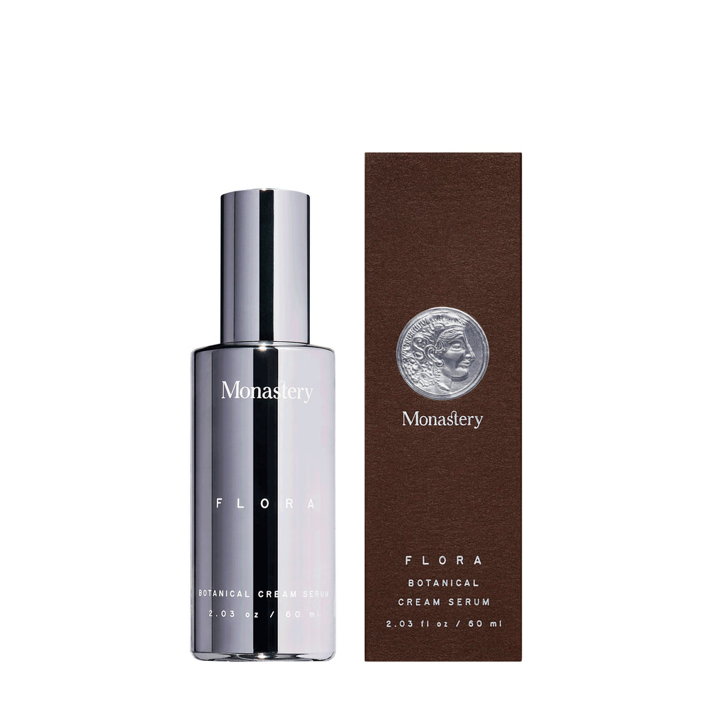 Flora botanical cream serum from Monastery in silver bottle with silver cap and next is its box packaging, on white background