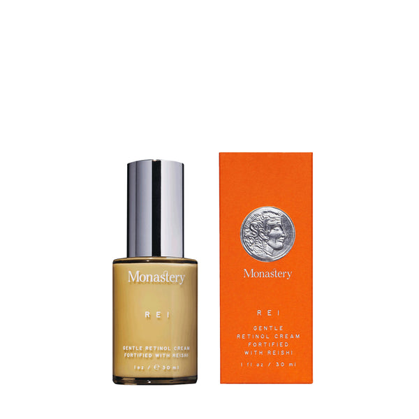 Bottle of Rei retinol serum displayed on a white background.