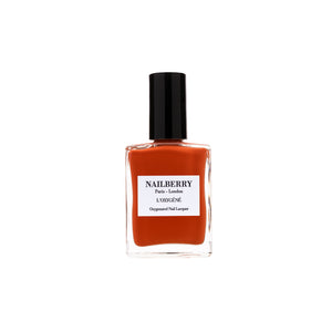 Bottle of NAILBERRY Pumpkin Pie nail polish in spiced terracotta orange shade, vegan breathable formula.