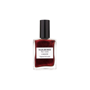 Bottle of NAILBERRY Very Merry Merlot nail polish in pearlised burgundy-black shade with shimmering, festive finish.
