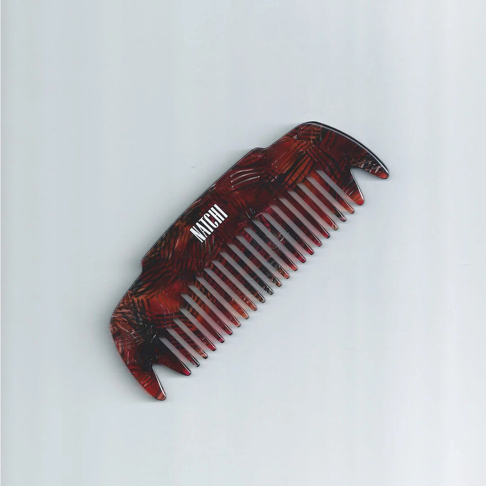NATCHI COCO Dry Comb in red with wide teeth, designed for oiling and detangling dry hair.