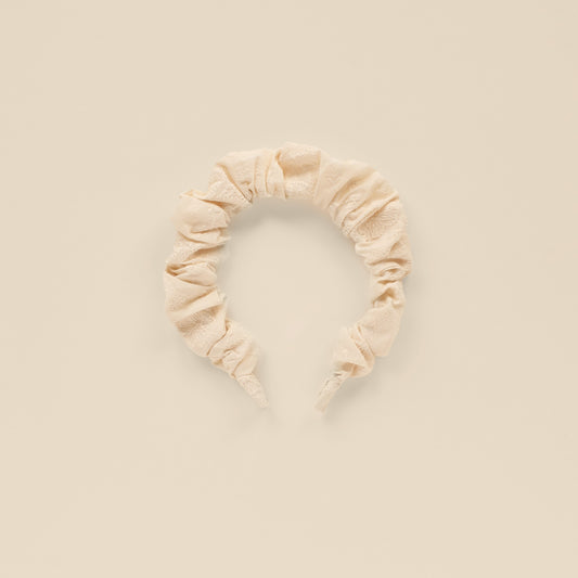 NORALEE Gathered Headband in natural embroidered fabric, ideal for accessorizing party dresses.