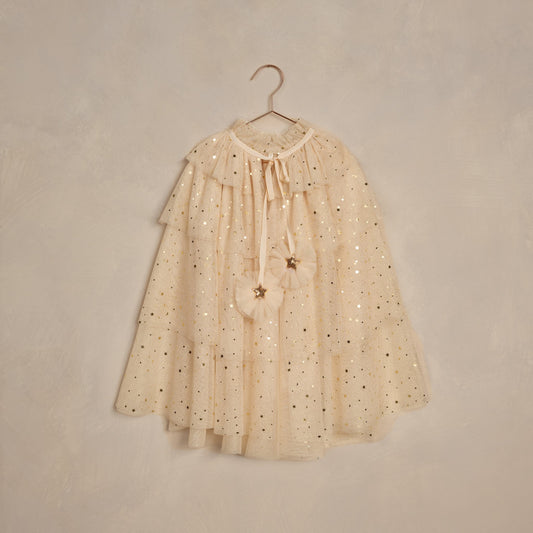 NORALEE Tulle Cape in champagne stars with soft tulle and gold glitter stars, perfect for parties or imaginative play.