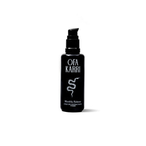 OFA KARRI Monthly Release – a natural massage oil with organic essential oils, featuring a warm, floral scent in a 50ml purple glass bottle.