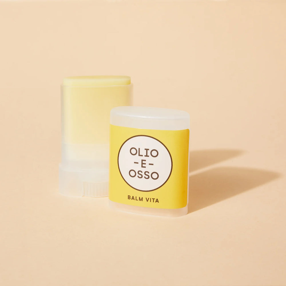 OLIO E OSSO Balm Vita in a tube packaging on white background