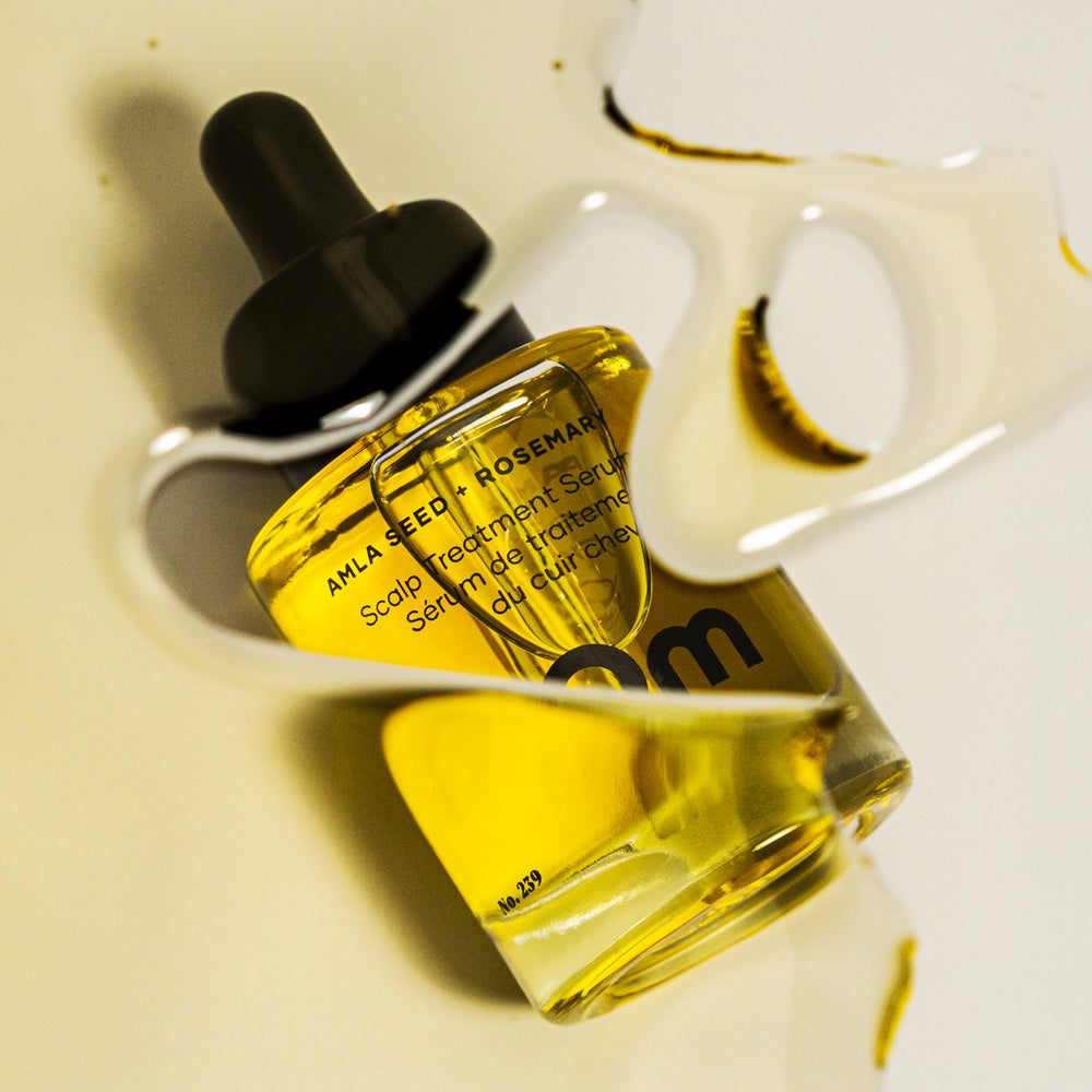 OM ORGANICS Amla Seed + Rosemary Scalp Serum in a 30 ml bottle, formulated with nourishing oils like rosemary, amla seed, and black cumin for a balanced and refreshed scalp.