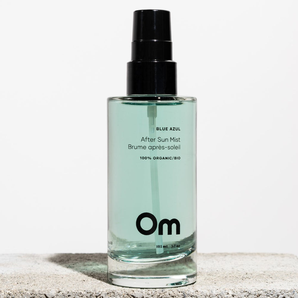 OM Organics Blue Azul After Sun Mist in a 105 ml bottle, featuring aloe vera, peppermint water, and coconut water to soothe and hydrate post-sun skin. Ideal for face and body, with a cooling peppermint and aloe scent.