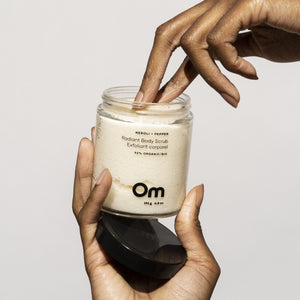 Om Organics Neroli + Pepper Radiant Body Scrub with a blend of citrus, neroli flower, rosewood, and vanilla. A moisturizing exfoliating scrub for silky smooth and radiant skin.