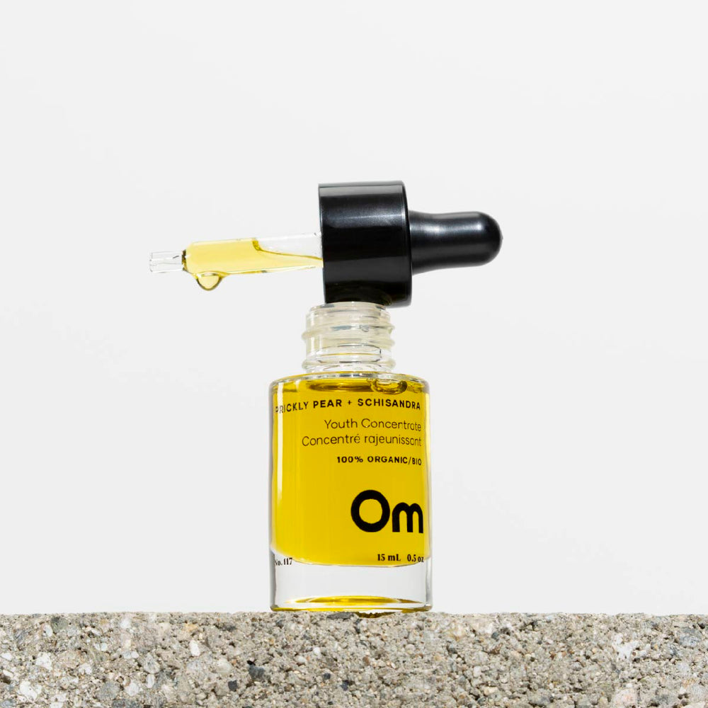 Om Organics Prickly Pear + Schisandra Youth Concentrate bottle, showcasing the luxurious formula that nourishes and hydrates the skin for a radiant, replenished appearance.