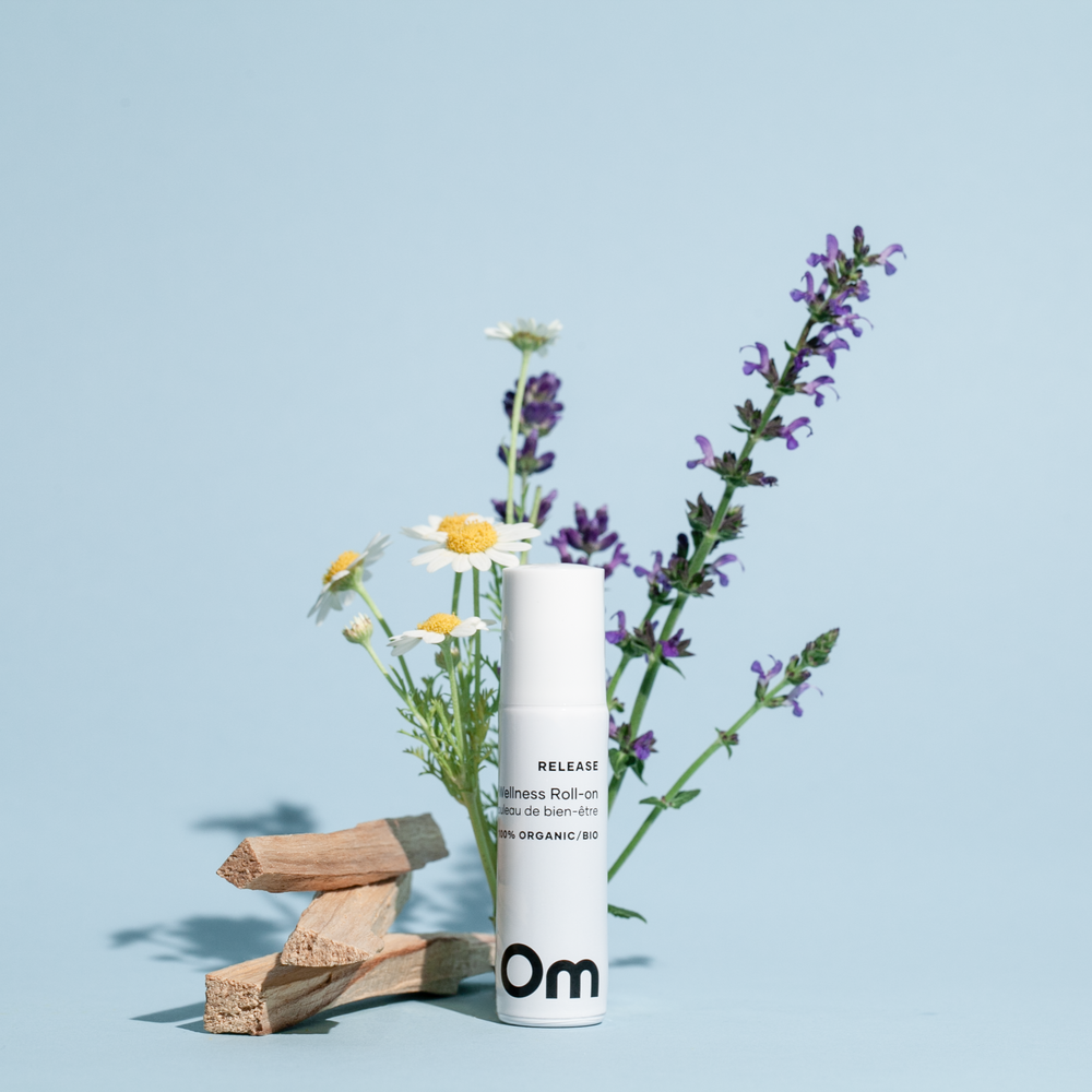 OM Organics Release Wellness Roll On – a 10ml essential oil blend with lavender, chamomile, and vetiver in a jojoba base.