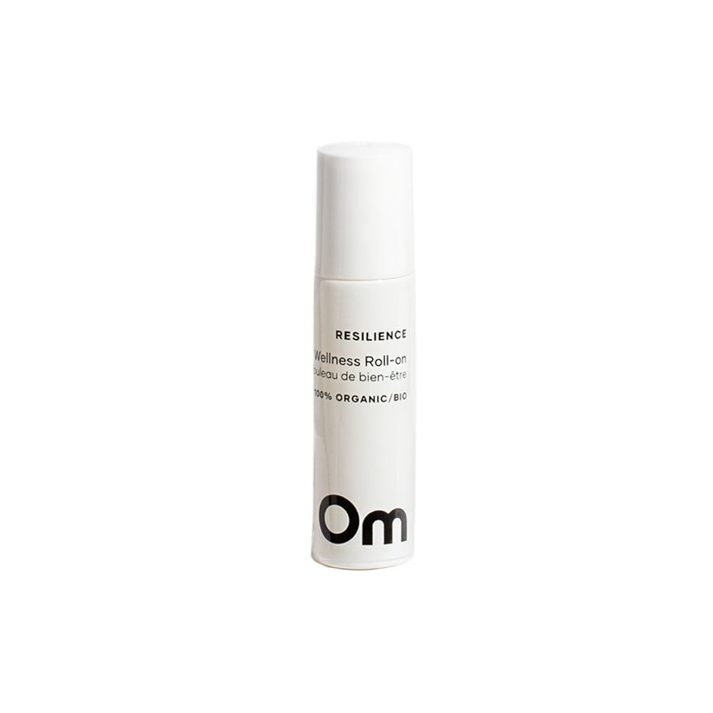 Om Organics Resilience Wellness Roll-On, a refreshing blend of sweet orange, black pepper, and vanilla in a 10 ml bottle. Organic, vegan, and cruelty-free.
