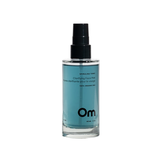 OM ORGANICS Spirulina Tonic Clarifying Face Mist bottle with a clean, minimal design, showcasing key ingredients like spirulina, sandalwood water, and rosemary water.