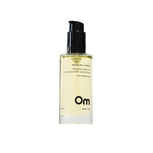 Om Organics Wild Plum + Cypress Aromatic Body Oil, a hydrating, nourishing oil for silky soft, glowing skin. Features sweet plum and woodsy cypress for a luxurious, all-over glow.