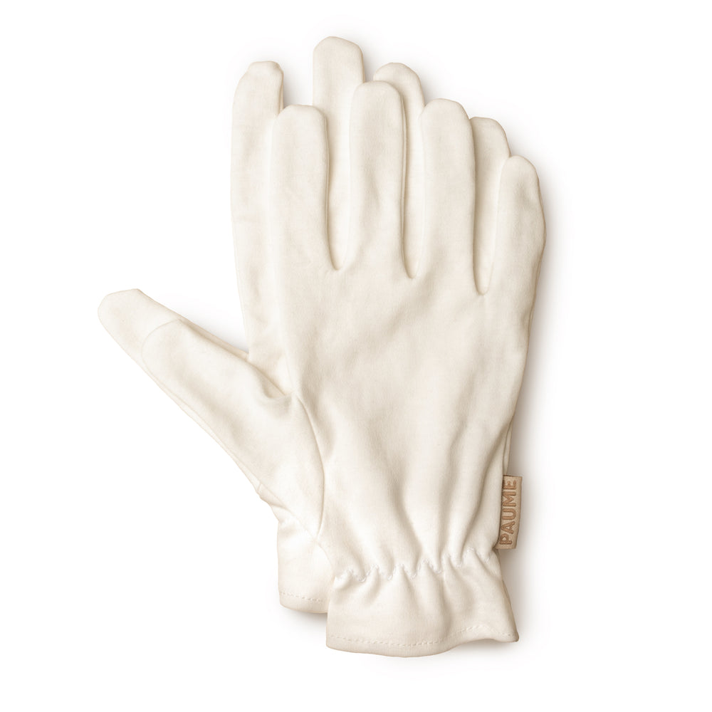 PAUME Overnight Hydration Gloves – 100% organic cotton gloves designed to deliver concentrated moisture for soft, hydrated hands by morning.