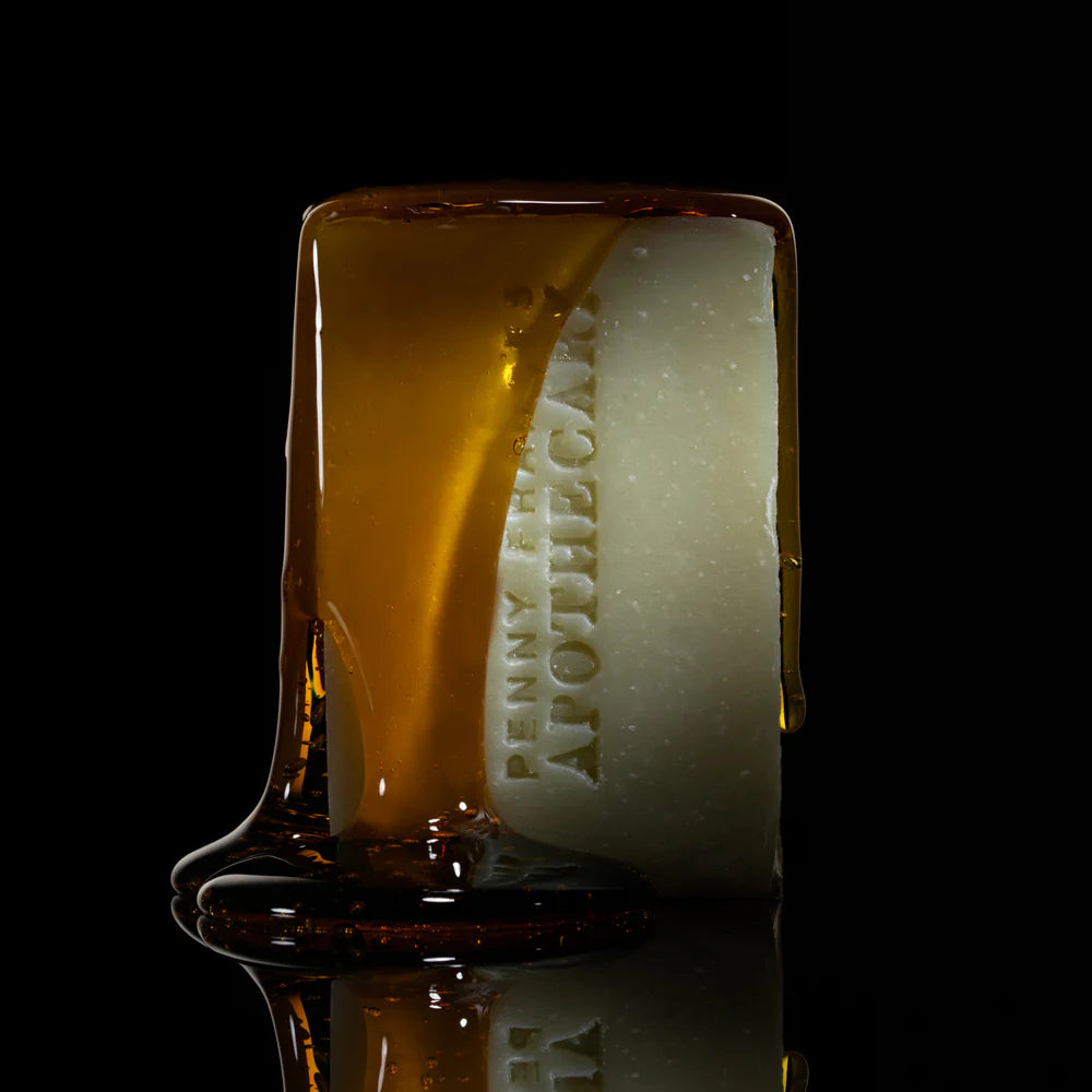 Penny Frances Apothecary Geranium & Black Pepper Botanical Soap Bar, featuring a luxurious blend of plant oils, honey, and French green clay for smooth, soft skin.