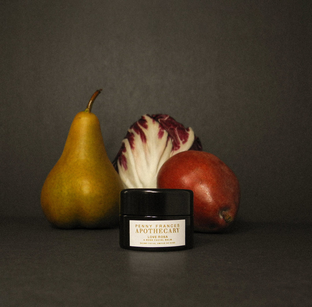 Penny Frances Apothecary Love Rosa Facial Balm jar with a rich blend of Bulgarian rose, hibiscus, and prickly pear, ideal for radiant and nourished skin.
