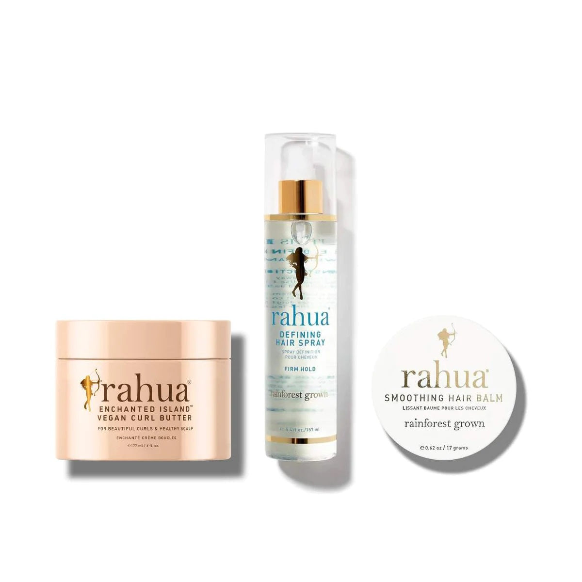 RAHUA Curl Styling Rituals - set includes Enchanted Island™ Vegan Curl Butter, Defining Hair Spray, and Smoothing Hair Balm. Enhance and define natural curls with this trio. Rich Rahua oil-based curl butter softens and enriches strands. Sugarcane extract hair spray provides firm, long-lasting hold. Gardenia-scented smoothing balm adds shine and smooths edges.