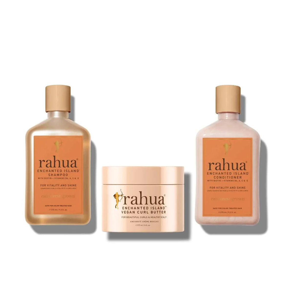 Rahua Enchanted Curl Rituals - set includes Enchanted Island™ Shampoo, Conditioner, and Vegan Curl Butter. Vitamin and antioxidant-rich duo promotes healthy-looking hair and strengthens strands with plant-based Biotin and Vitamins B6, A, C, and E. Vegan Curl Butter enhances curls with Rahua oil, adding hold, weight, and shine. Ideal for all curl types.