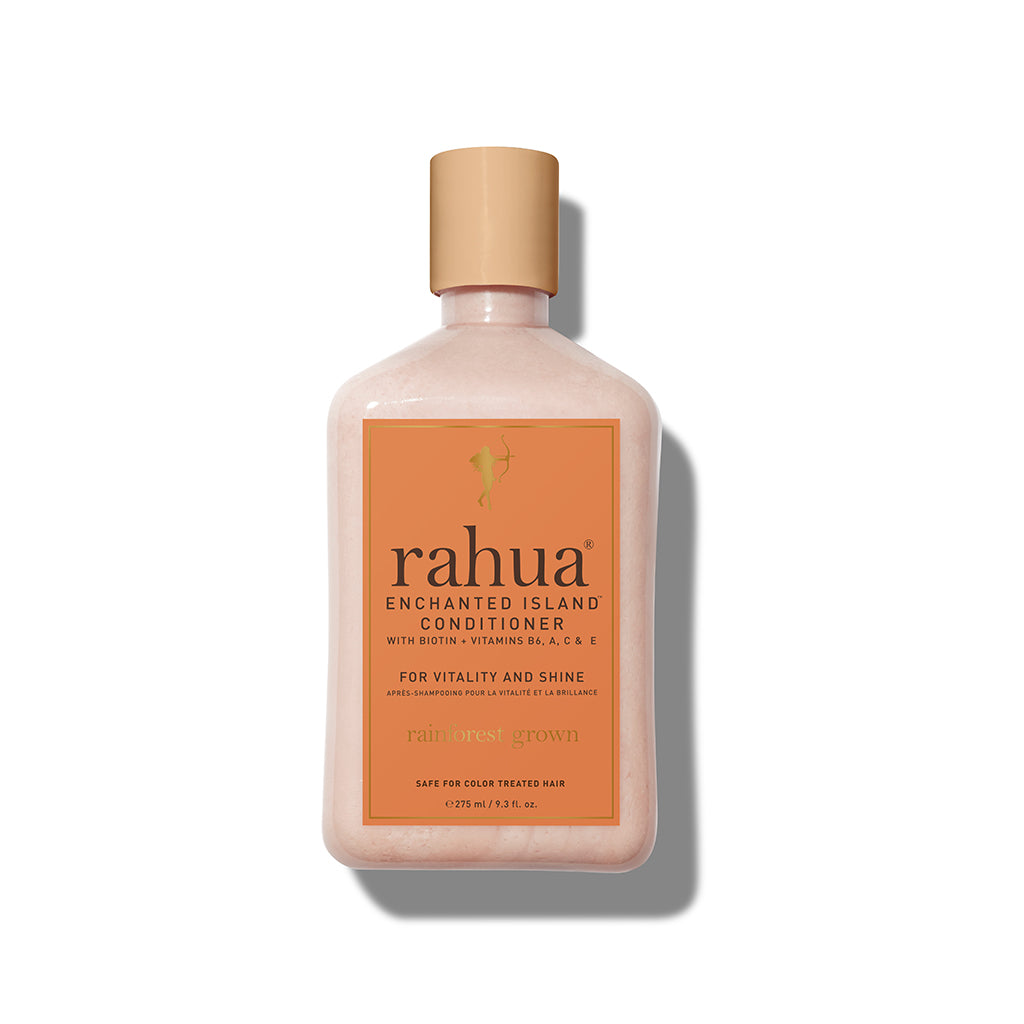 RAHUA Enchanted Island™ Conditioner - tropical conditioner to strengthen and add radiance to all hair types. Infused with plant-based Biotin, Vitamins B6, A, C, and E, and antioxidants like pomegranate, Guayusa, Rahua, Morete, and Sacha Inchi oils. Adds vibrancy and shine with aromas of guava and coconut. full size