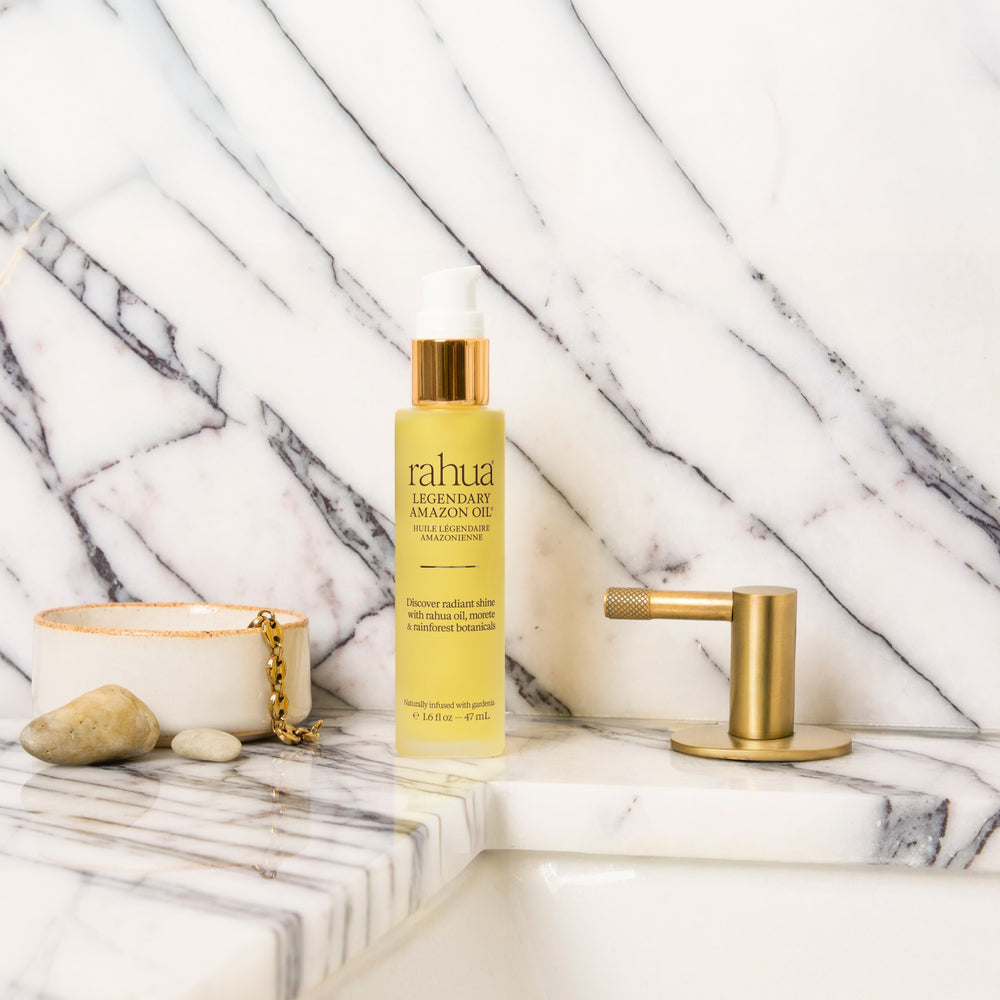 Bottle of Rahua Legendary Amazon Oil on a white background