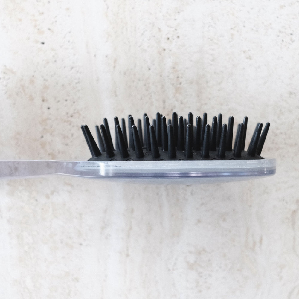 Reverie Good Detangling Hair Brush with cone-shaped pins, designed for gentle detangling without breakage, handcrafted in Italy.