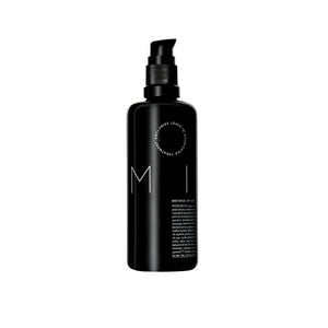 Bottle of REVERIE Milk Anti-Frizz Leave-In Nourishing Serum — a silicone-free, multi-tasking hair serum for all hair types that moisturizes, softens, and protects. full size