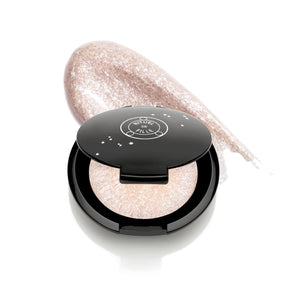 Rituel de Fille Highlight Intensifier in The Alchemist, packaged in a compact.