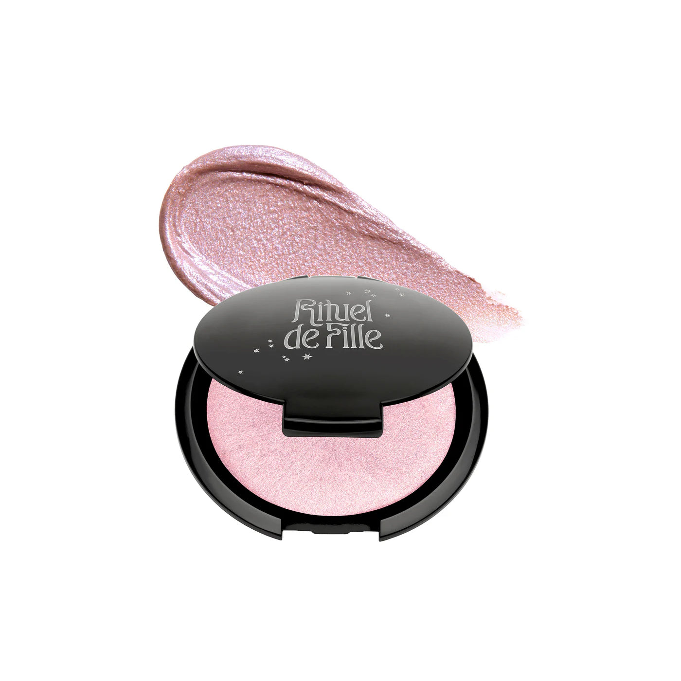 RITUEL DE FILLE Rare Light Crème Luminizer Aurora, a mauve-pink cream highlighter with a soft, iridescent glow in a sleek compact.