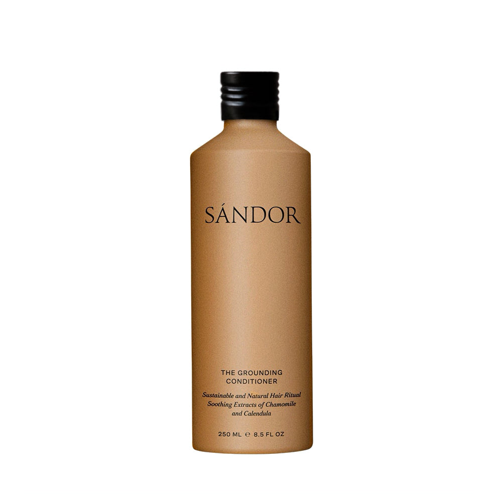 SANDOR The Grounding Conditioner bottle with aluminum cap on white background, plant-based hydrating hair conditioner made with Aloe Vera, Jojoba Oil, and Oat Amino Acids. With a Pump