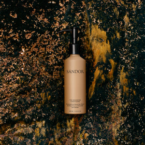 SANDOR conditioner bottle on a textured dark background ALWAYS SHOW