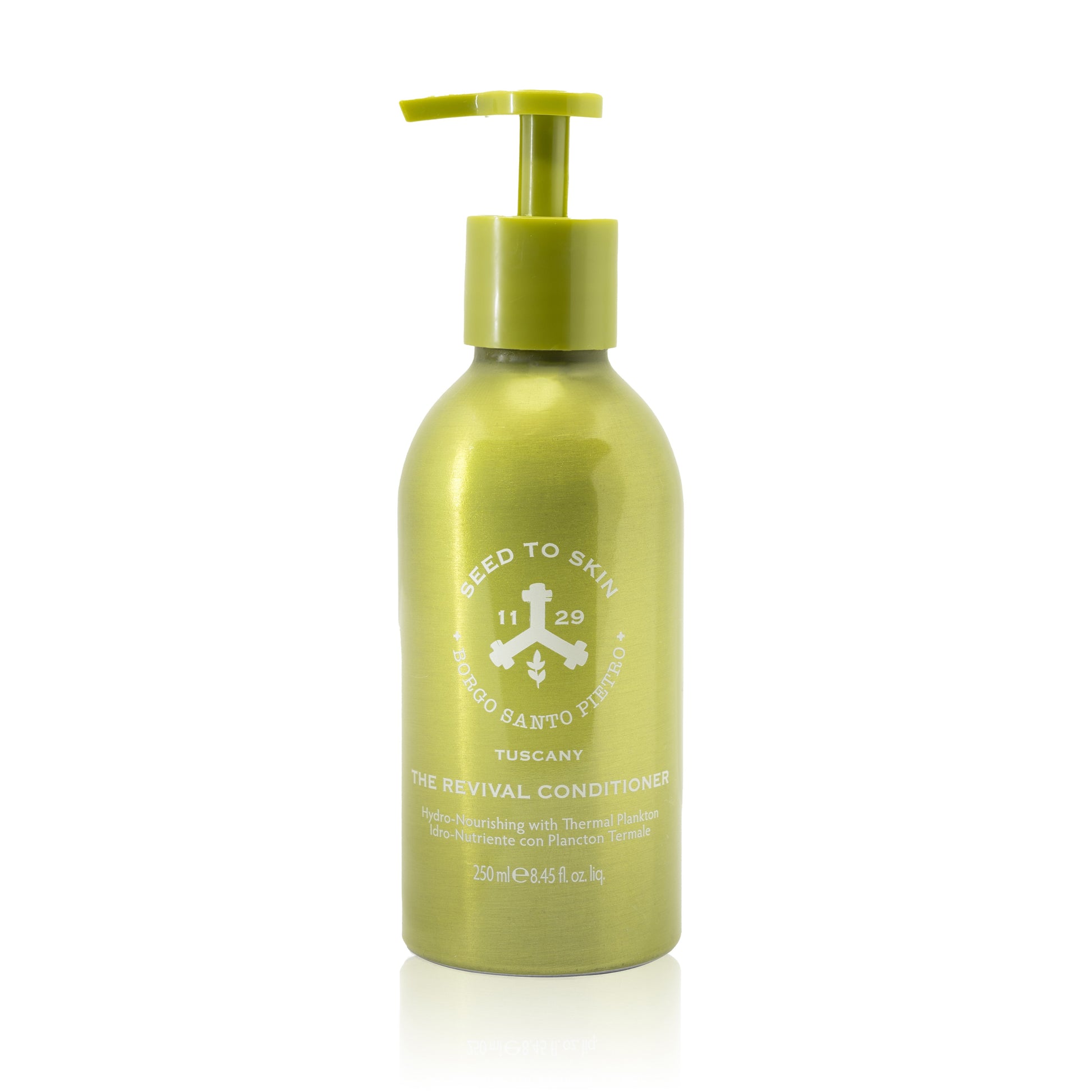 SEED TO SKIN TUSCANY - The Revival Conditioner, a nourishing hair conditioner with thermal water, olive leaf extract, and rosemary, designed to hydrate and restore shine.