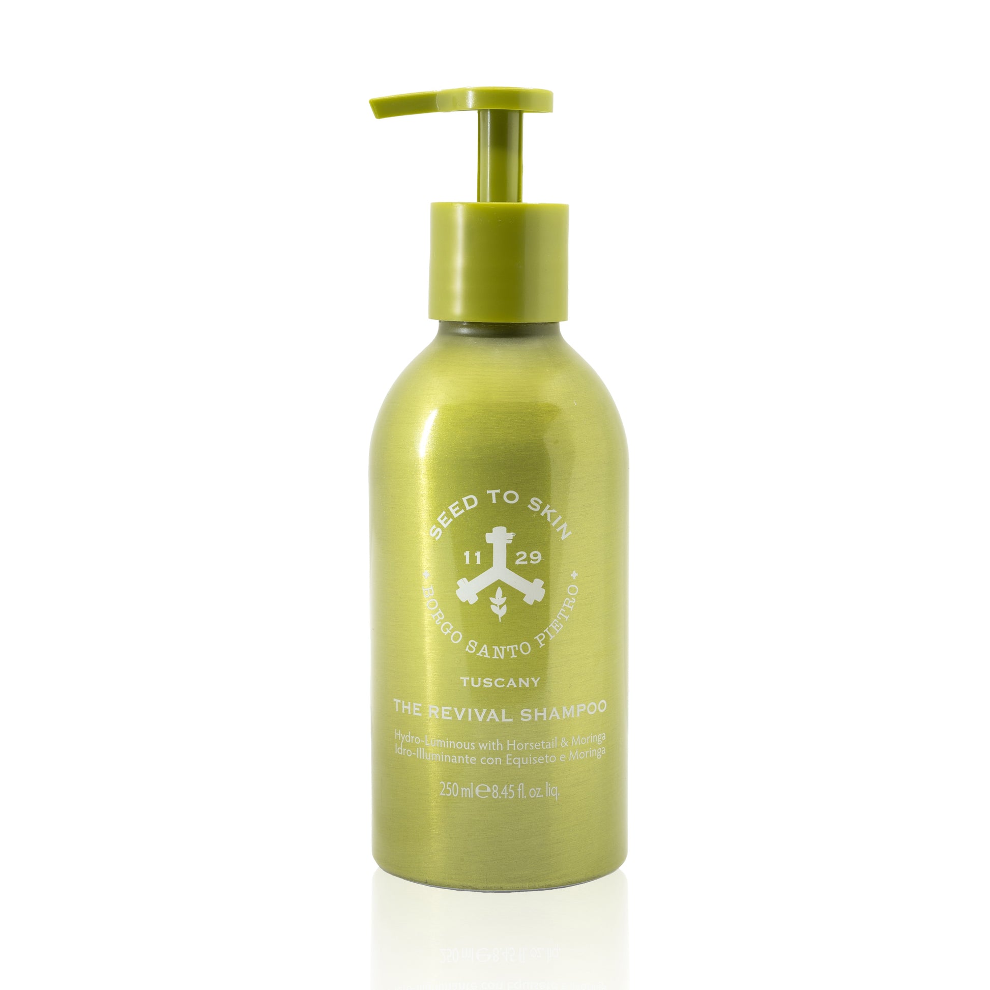 Bottle of Seed to Skin Tuscany Revival Shampoo with horsetail and moringa for hydration and nourishment.