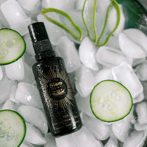 Black bottle of SIAM SEAS Yen Essence Toner with gold design on a bed of ice and cucumber slices. ALWAYS SHOW
