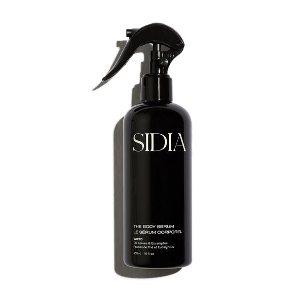 SIDIA The Body Serum in a click-close spray bottle, hydrating and nourishing with hyaluronic acid, squalane, and prickly pear extract.