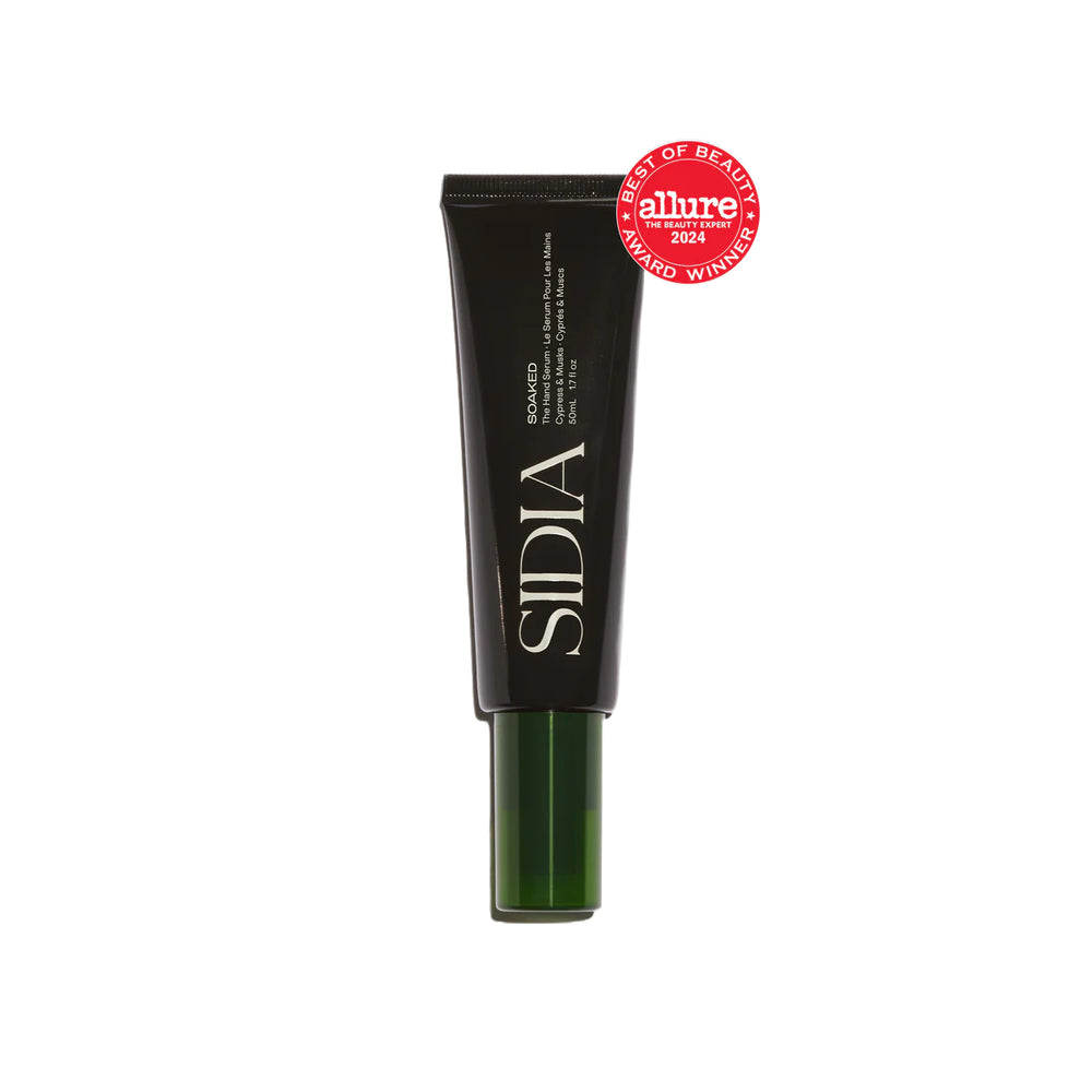 SIDIA The Hand Serum in a sleek bottle, featuring cactus flower, avocado butter, and aloe vera for hydrated, nourished skin.