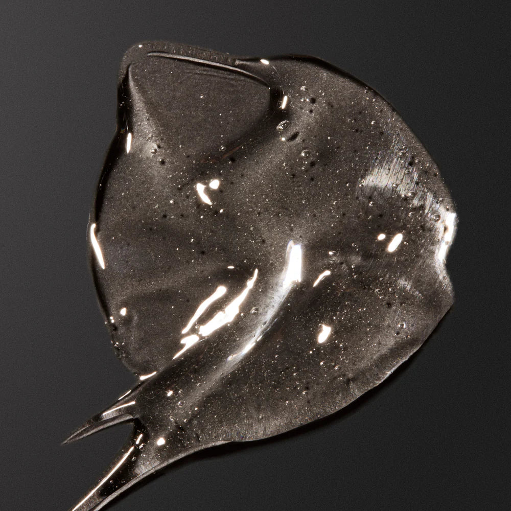 Green bottle with pump labeled 'SIDIA Soaked The Wash' on a white background