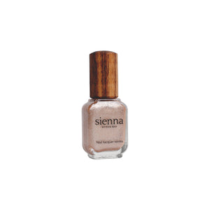  Sienna Byron Bay Believe Nail Polish – shimmery rose-peach shade in eco-friendly packaging.