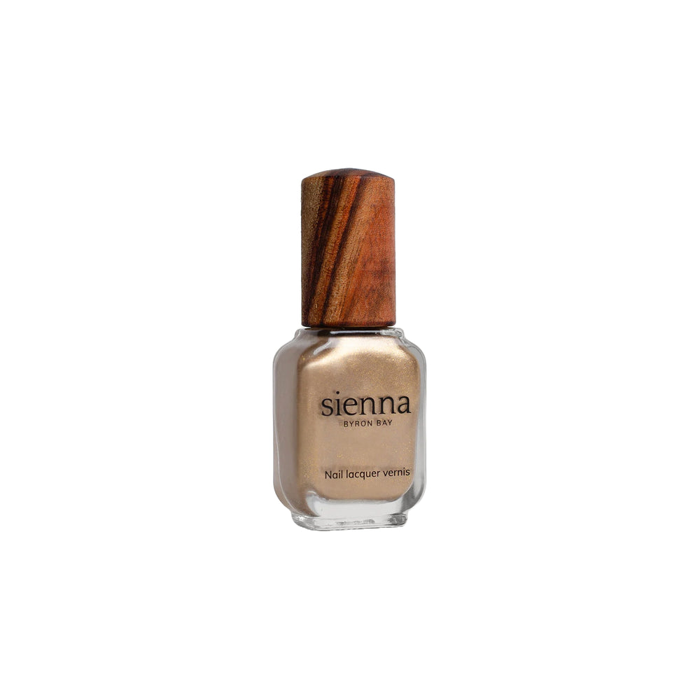 Sienna Byron Bay Divine Nail Polish – luminous gold shade in eco-friendly packaging.