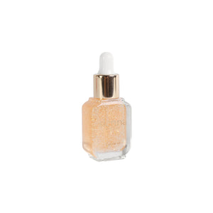 Sienna Byron Bay Golden Glow Cuticle Nectar - nourishing cuticle oil with golden flakes in an eco-friendly bottle.