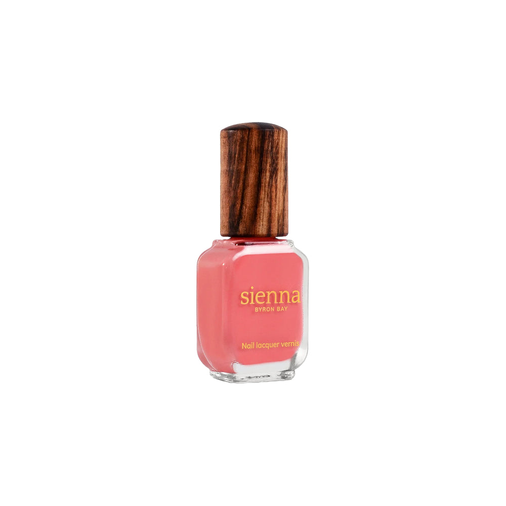 Sienna Byron Bay Laughter Nail Polish in a bright grapefruit sorbet crème shade with eco-friendly packaging.