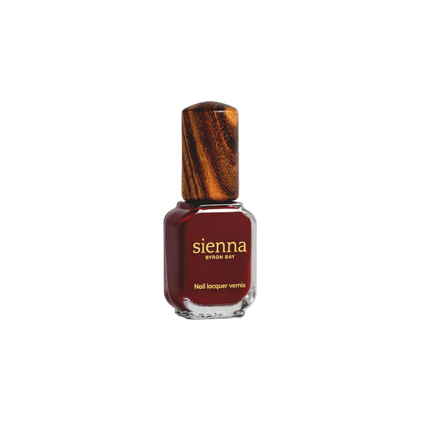SIENNA BYRON BAY Sacred Nail Polish in Garnet Crème – a deep, organic red with a smooth crème finish.