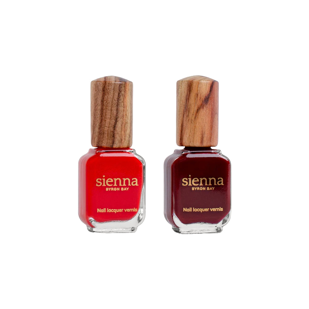 Sienna Byron Bay Spice Duo – a bold nail polish set featuring Passion (vermillion crème) and Sacred (garnet crème) in eco-friendly packaging.
