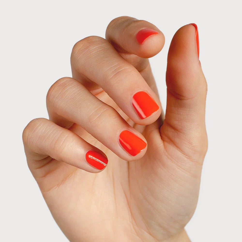 SIENNA BYRON BAY Tango Nail Polish in Tangerine Crème – a retro-inspired, vibrant orange shade.