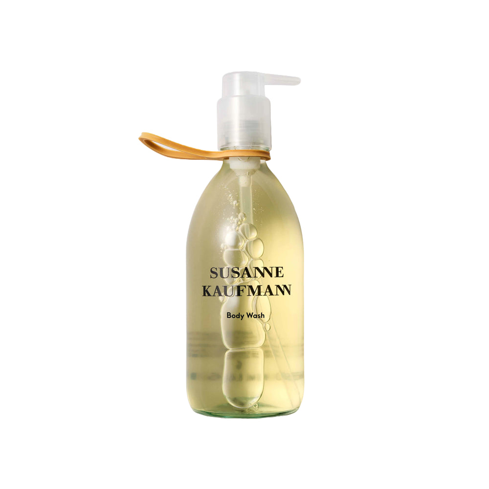 Susanne Kaufmann Body Wash in a 250ml bottle with natural ingredients like rosehip seed oil, aloe vera, and silk protein. Perfect for gentle cleansing and hydration.