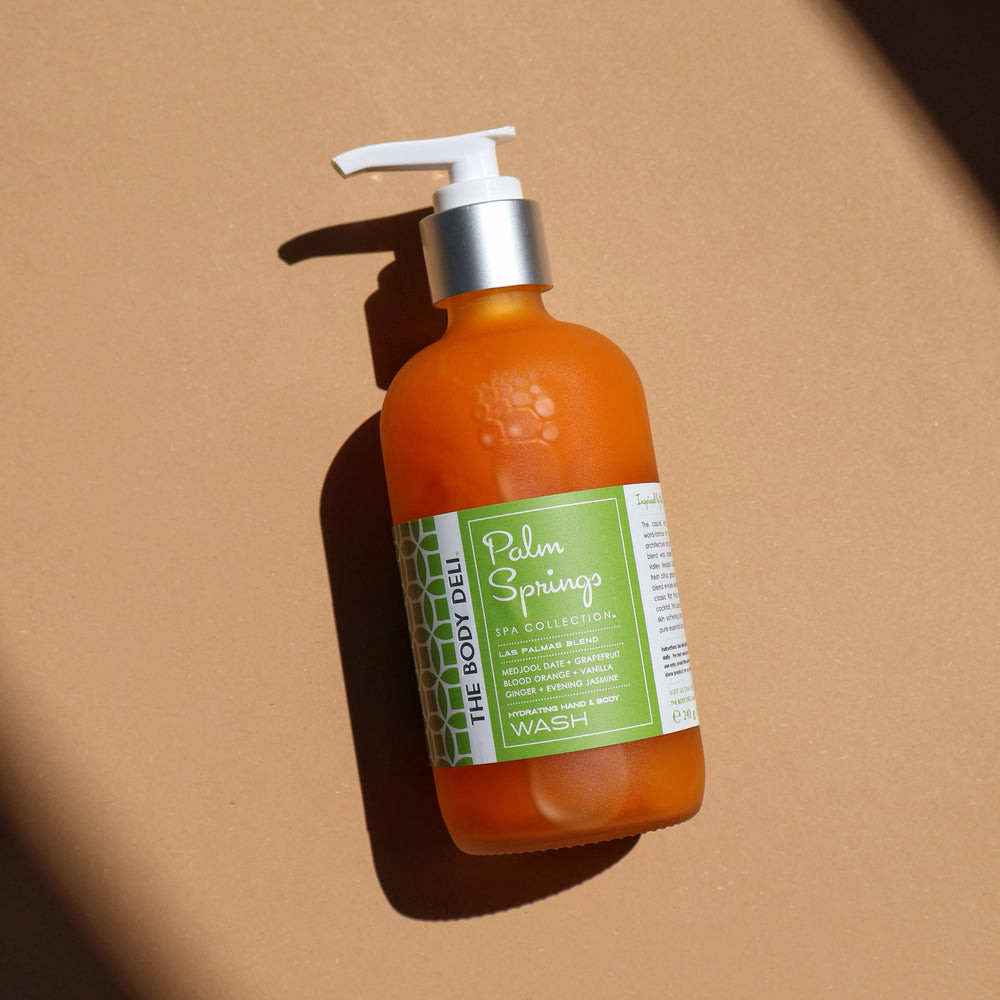 THE BODY DELI PALM SPRINGS Hand & Body Wash – glass pump bottle shown on a white background.